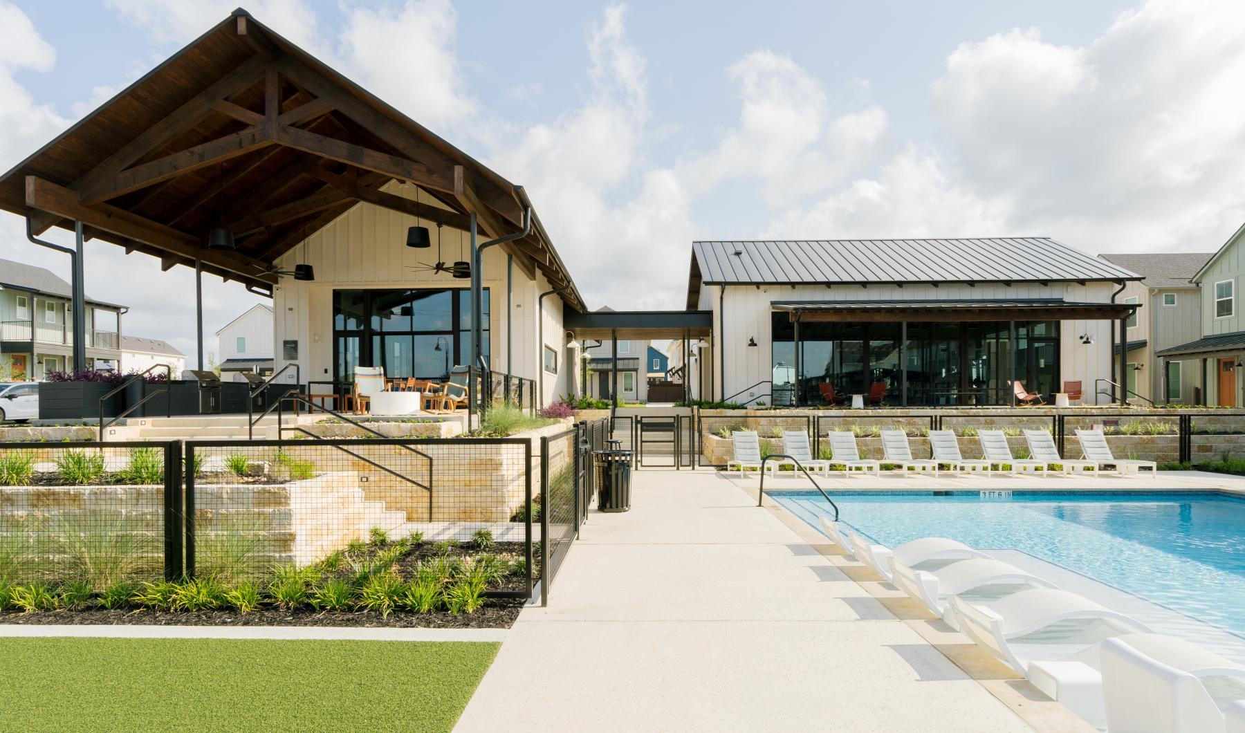 a swimming pool outside of a house