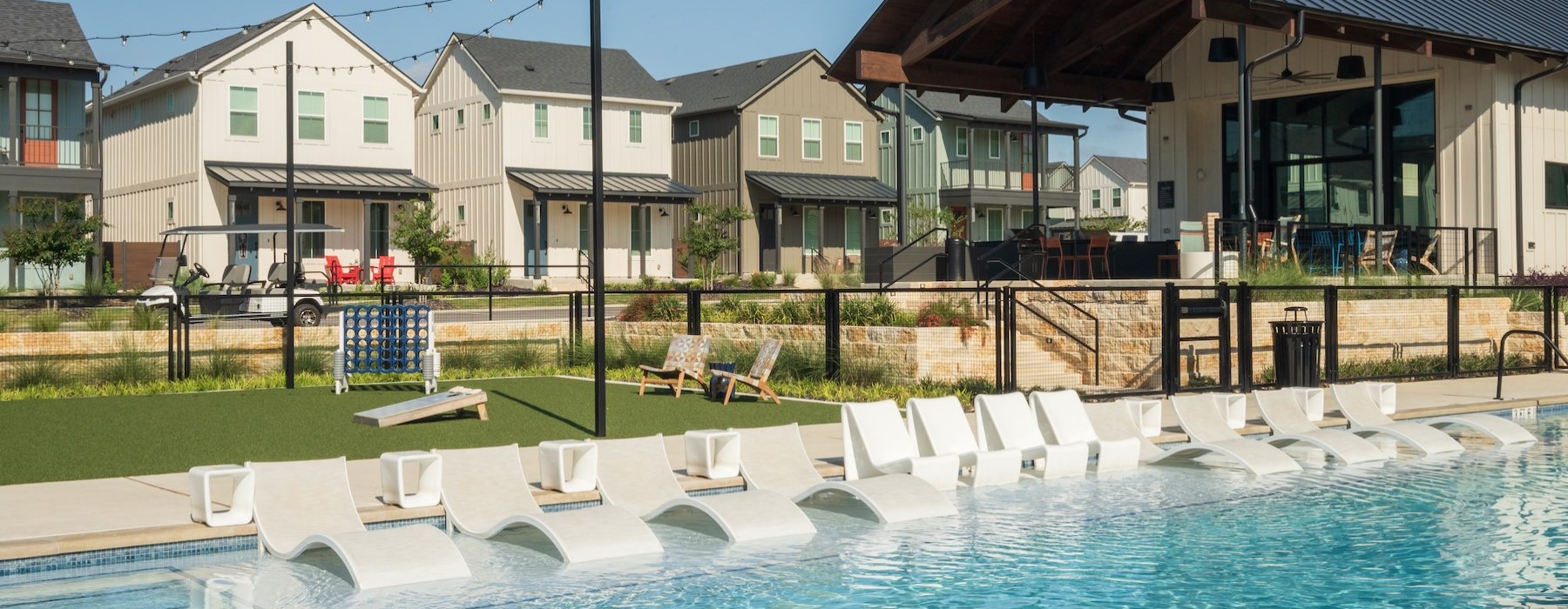 a pool with chairs around it