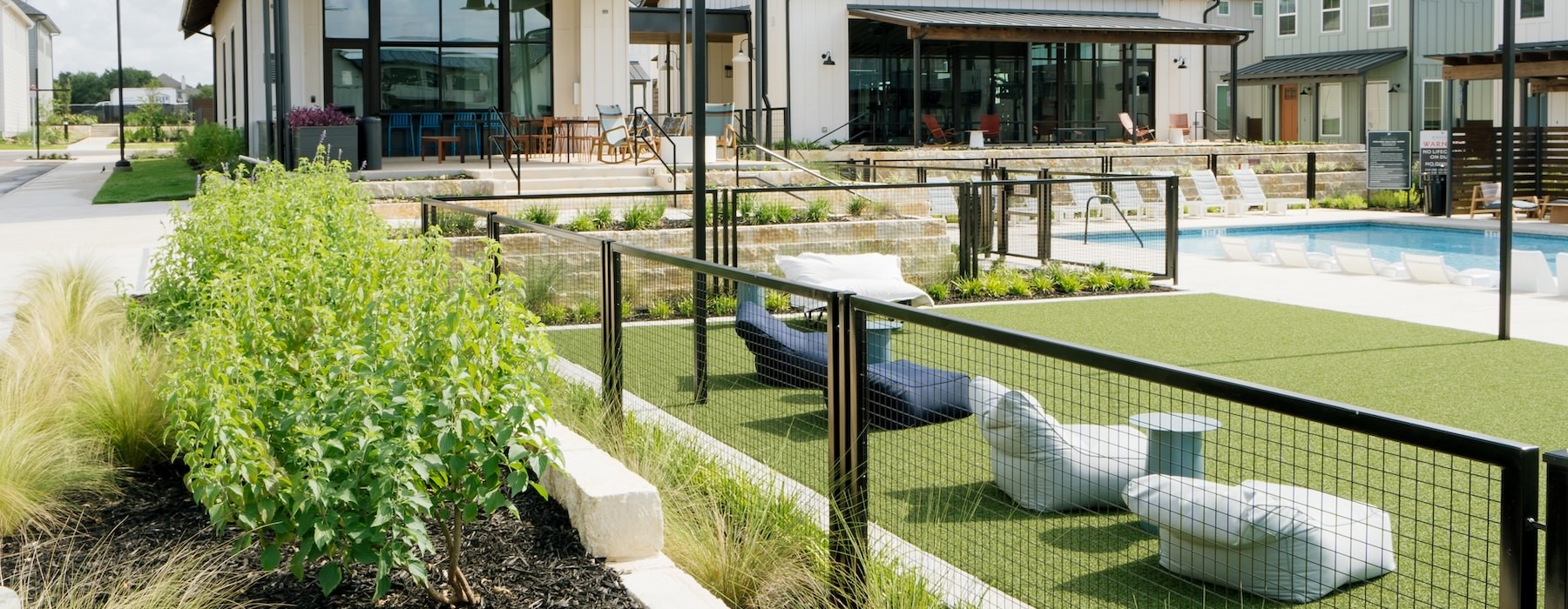 a backyard with a swimming pool