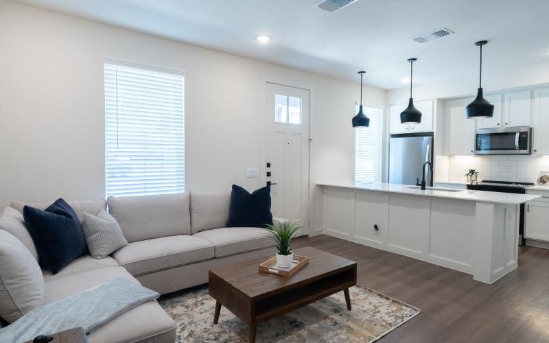 a living room with a couch and a table